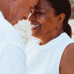 Picturing a family of 3 generations enjoying their beach portrait in Waikiki, Hawaii