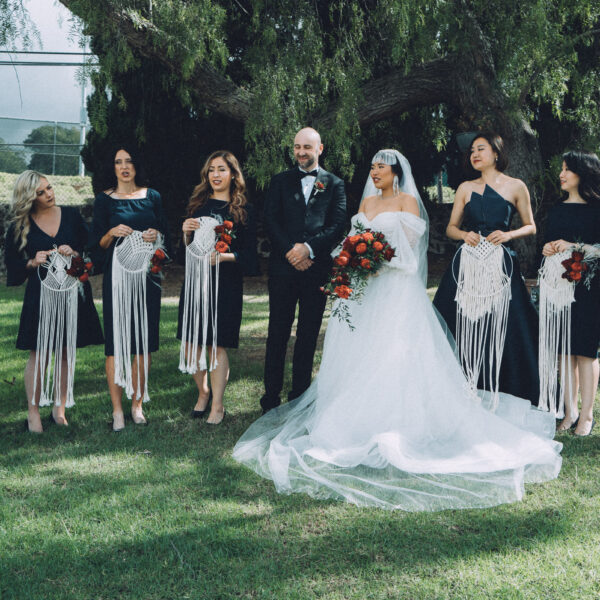 Hawaii Wedding Photographer capturing Bride and groom with guests after ceremony