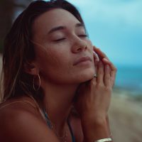 Lifestyle Photography of a woman in her bikini on the beach in Hawaii