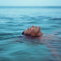 Lifestyle Photography of a woman in her bikini on the beach in Hawaii