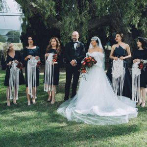 Hawaii Wedding Photographer capturing Bride and groom with guests after ceremony