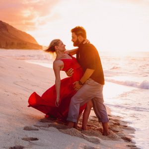 Romantic couples session with dramatic sunset on Oahu's North Shore