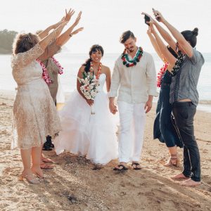 Kuaui Elopement style wedding ceremony, bridge and groom and guest